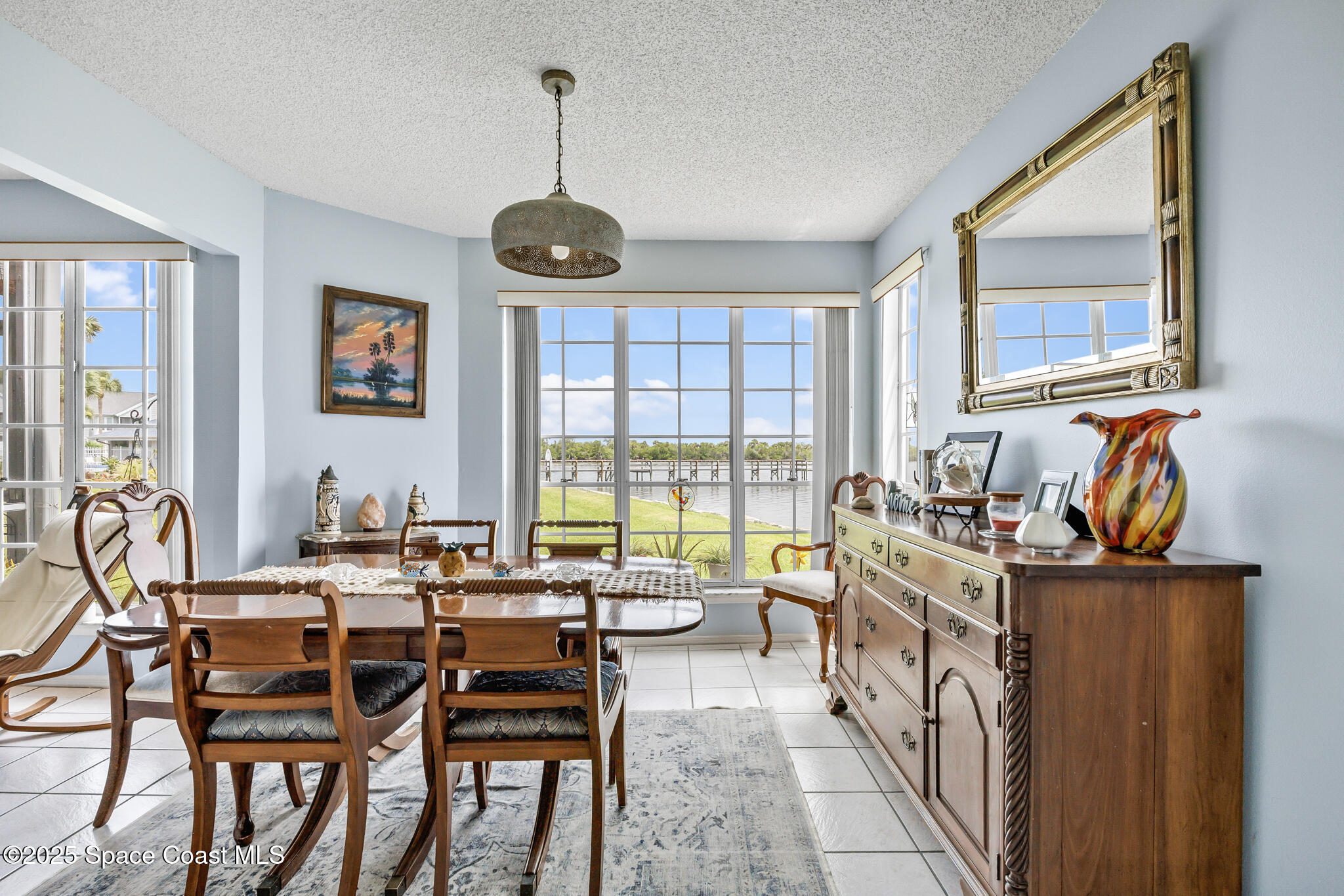 7420 U.S. Rte 1, Unit 106 Cocoa, FL 32927 - Photo 30 of 41 a view of a dining room with furniture window and outside view