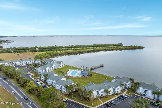 a view of a city with an ocean