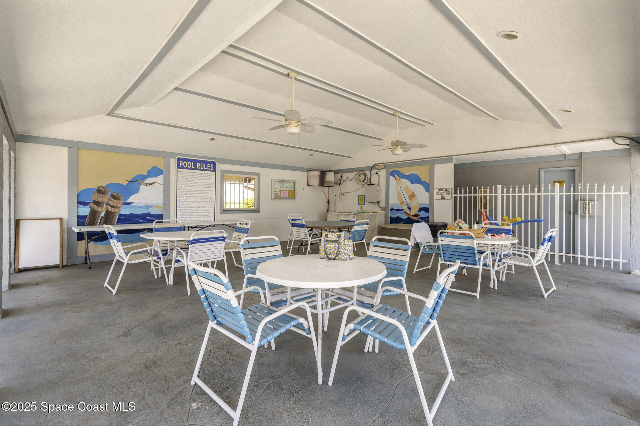 7420 U.S. Rte 1, Unit 106 Cocoa, FL 32927 - Photo 8 of 41 a table and chairs in a room