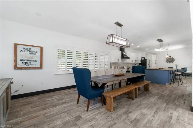 a view of a dining room with furniture