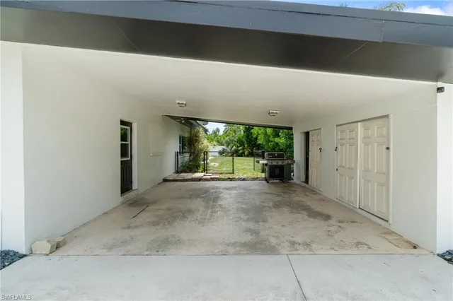 a view of a big room with large windows