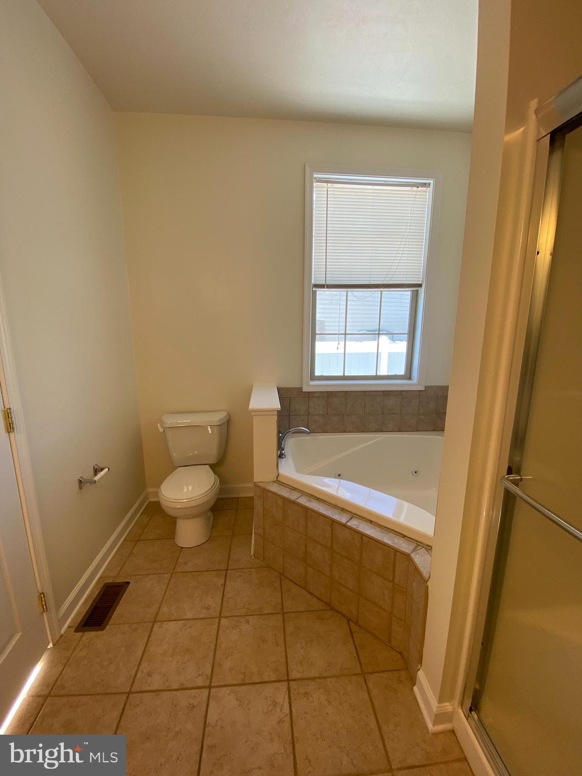 21 Birch Drive Hanover, PA 17331 - Photo 12 of 24 a bathroom with a bathtub and toilet