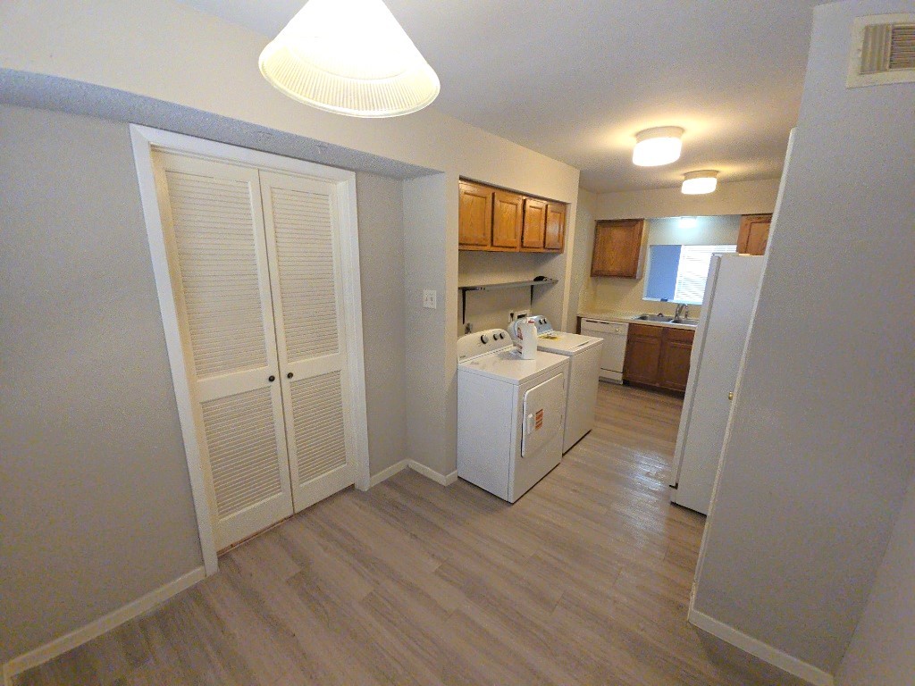 15625 Weldon Drive Houston, TX 77032 - Photo 2 of 25 a view of a kitchen with microwave and cabinets