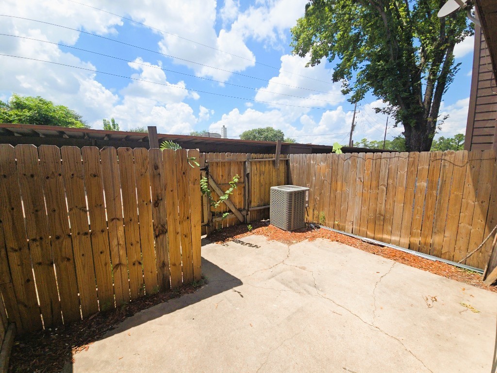 15625 Weldon Drive Houston, TX 77032 - Photo 21 of 25 a street view with wooden fence