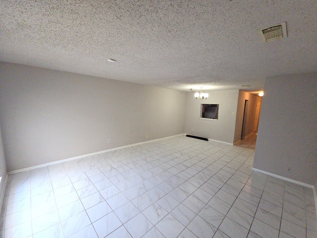 15625 Weldon Drive Houston, TX 77032 - Photo 3 of 25 a view of a big room with windows