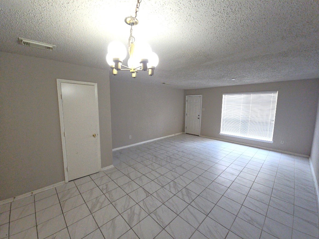 15625 Weldon Drive Houston, TX 77032 - Photo 6 of 25 a view of an empty room with a window