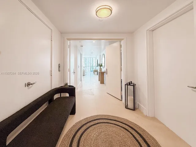view of a bedroom with a bed and wooden floor