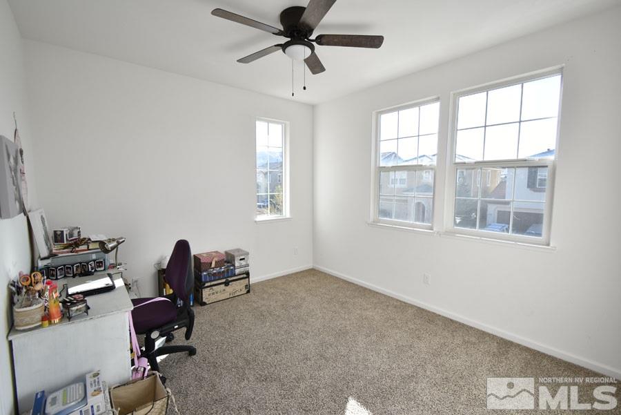 1955 Hope Valley Drive Reno, NV 89521 - Photo 10 of 16 a room with gym equipment and windows
