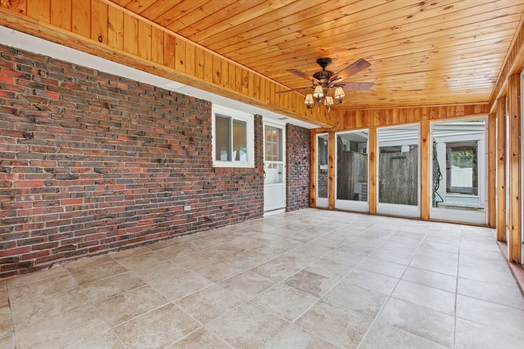 3 Spruce Street Stoneham, MA 02180 - Photo 14 of 38 a view of a building with a ceiling fan