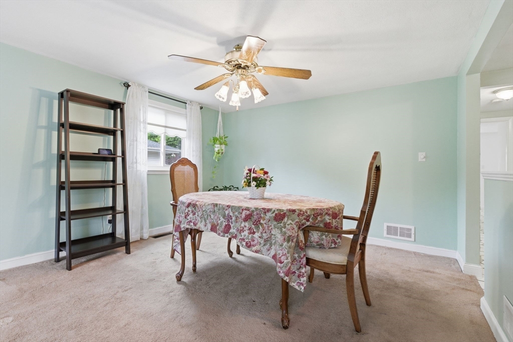 3 Spruce Street Stoneham, MA 02180 - Photo 19 of 38 a view of a dining room with furniture