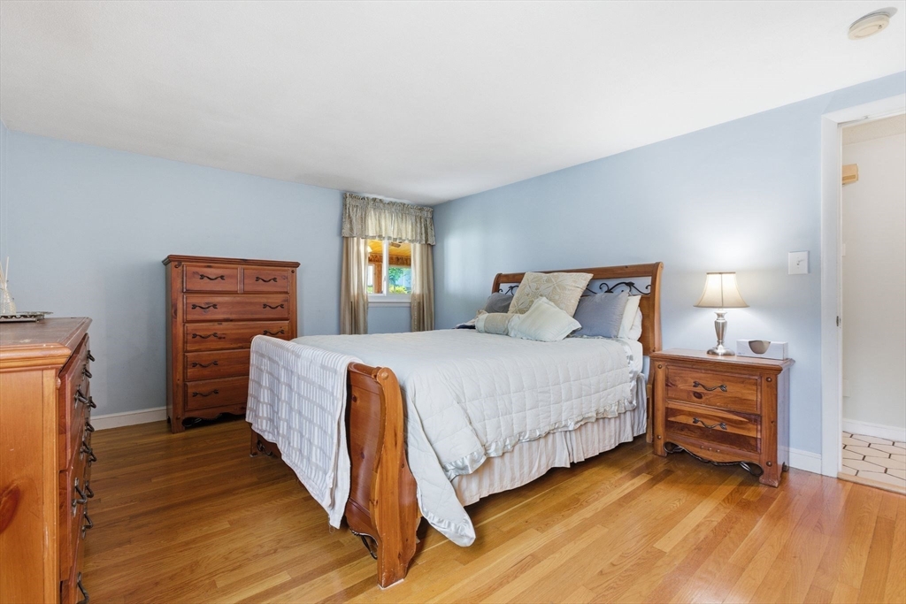 3 Spruce Street Stoneham, MA 02180 - Photo 20 of 38 a bedroom with a bed and a window