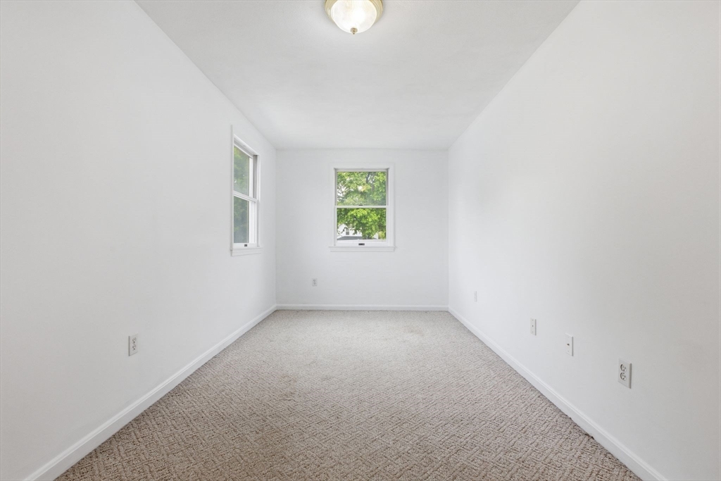 3 Spruce Street Stoneham, MA 02180 - Photo 23 of 38 an empty room with window