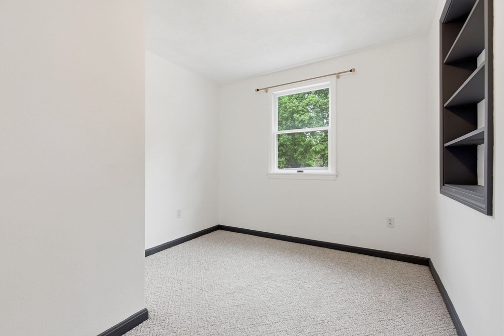 3 Spruce Street Stoneham, MA 02180 - Photo 25 of 38 an empty room with a window