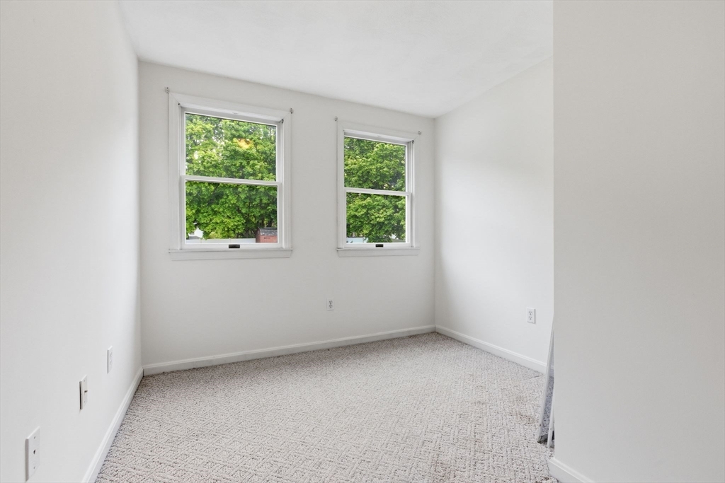3 Spruce Street Stoneham, MA 02180 - Photo 26 of 38 an empty room with a window