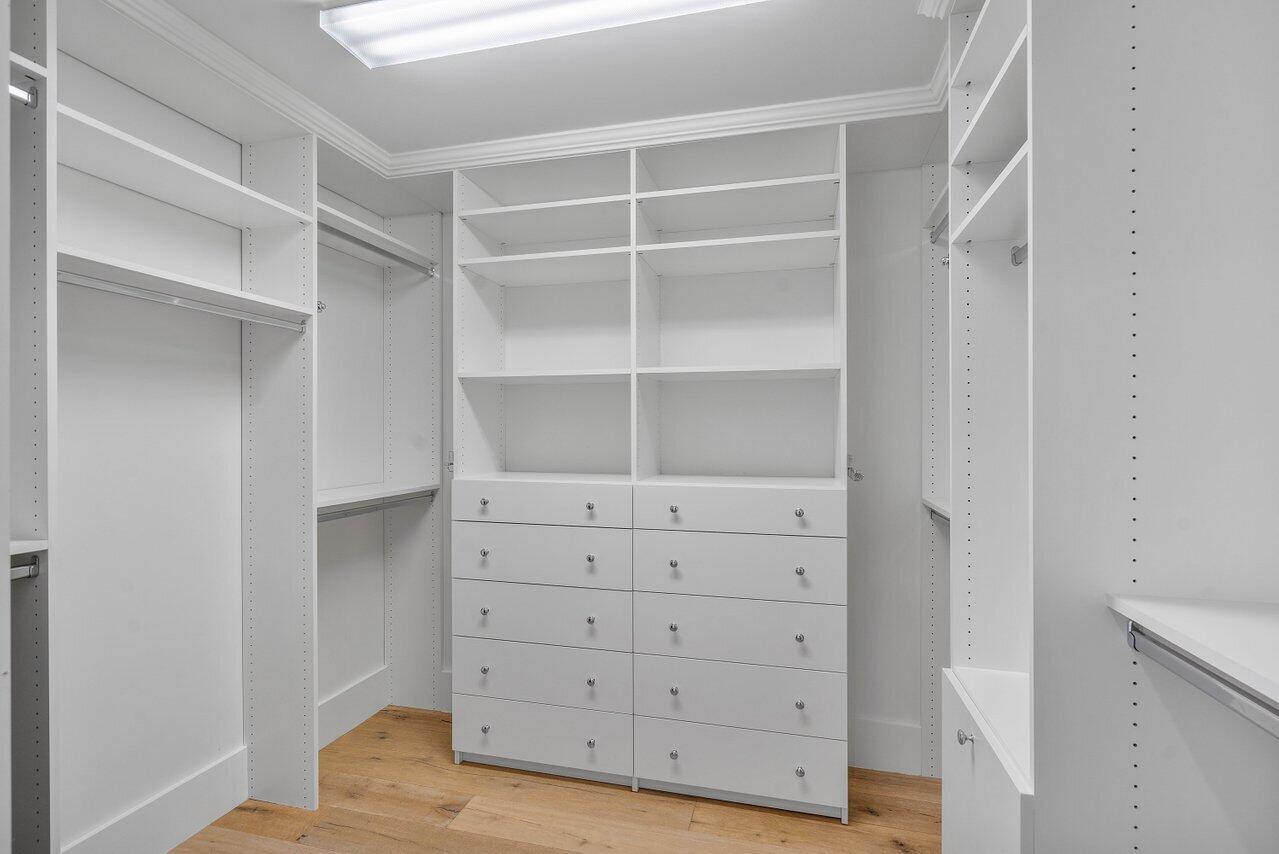 1041 Gulfstream Way Singer Island, FL 33404 - Photo 17 of 41 a view of an empty walk in closet