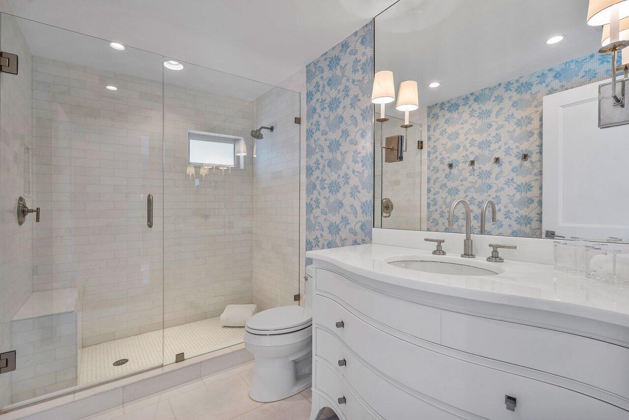 1041 Gulfstream Way Singer Island, FL 33404 - Photo 23 of 41 a bathroom with a sink toilet and shower