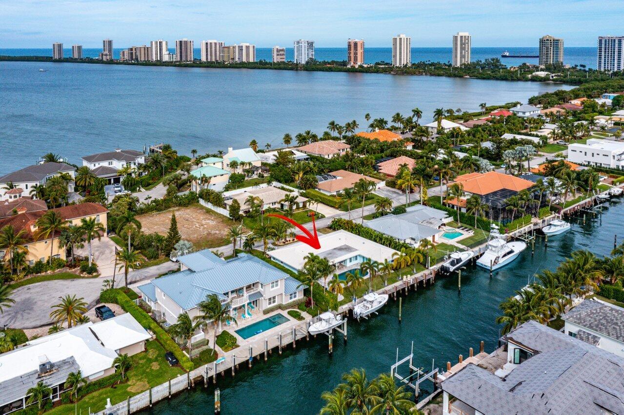 1041 Gulfstream Way Singer Island, FL 33404 - Photo 36 of 41 an aerial view of residential houses with outdoor space and lake view