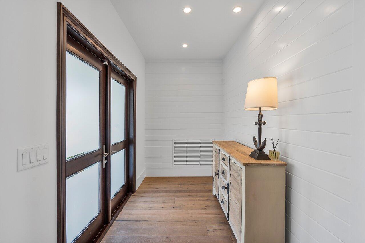 1041 Gulfstream Way Singer Island, FL 33404 - Photo 7 of 41 a view of hallway with stairs