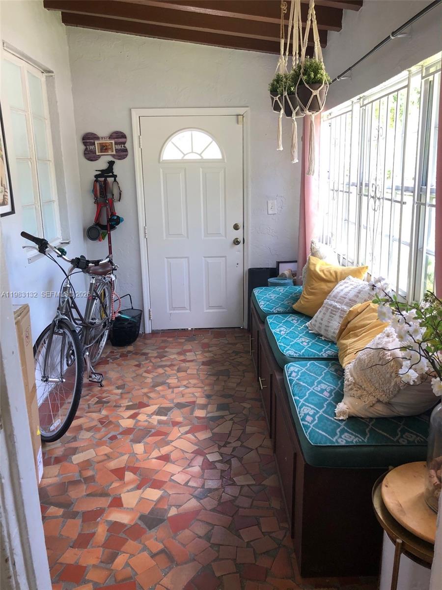 551 Northeast 69th Street, Unit 1&2 Miami, FL 33138 - Photo 2 of 15 a view of a livingroom with furniture and a furniture