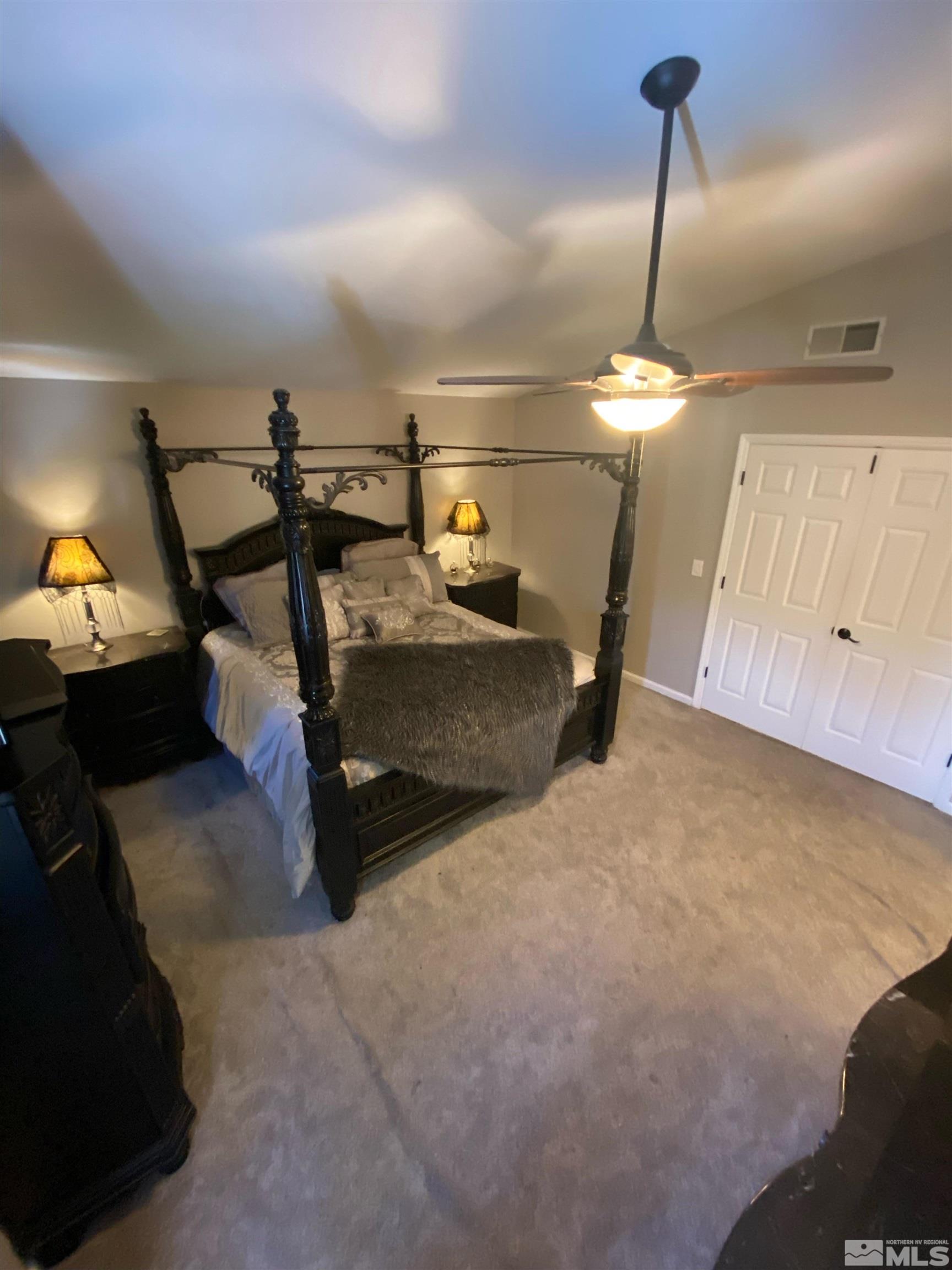 860 Swaledale Drive Reno, NV 89511 - Photo 14 of 19 a bedroom with bed and window