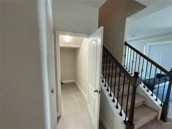a view of an empty room with a window