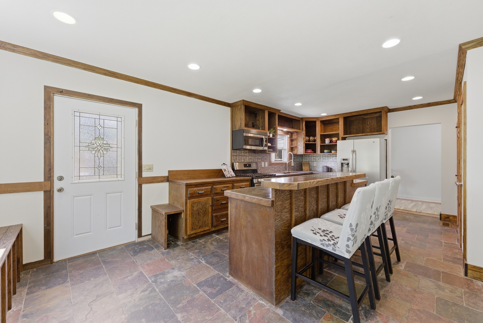 2405 31st Street Moline, IL 61265 - Photo 14 of 24 a kitchen with a refrigerator and a sink