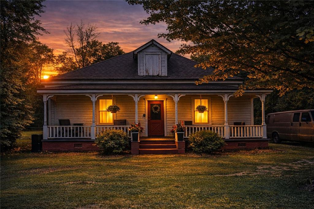 209 Old Perry Road Marshallville, GA 31057 - Photo 2 of 40 a front view of a house having yard