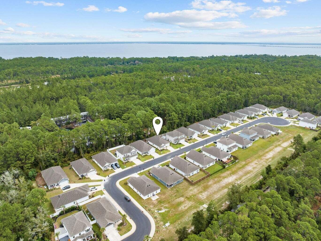 161 Southern Pnes Road Santa Rosa Beach, FL 32459 - Photo 17 of 20 a view of a lake with a yard