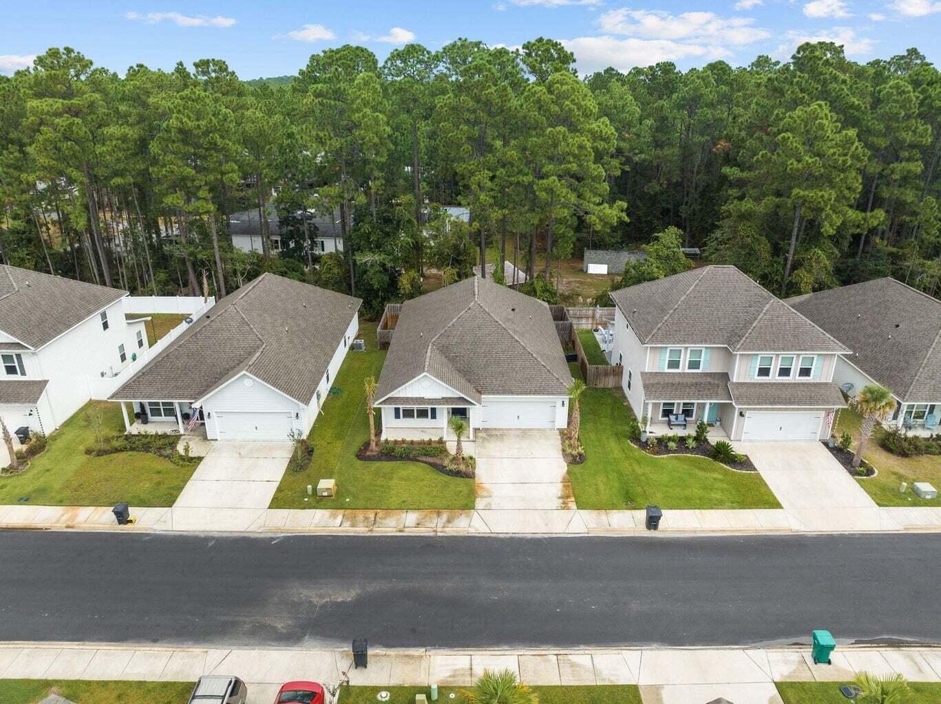 161 Southern Pnes Road Santa Rosa Beach, FL 32459 - Photo 2 of 20 an aerial view of residential houses with outdoor space