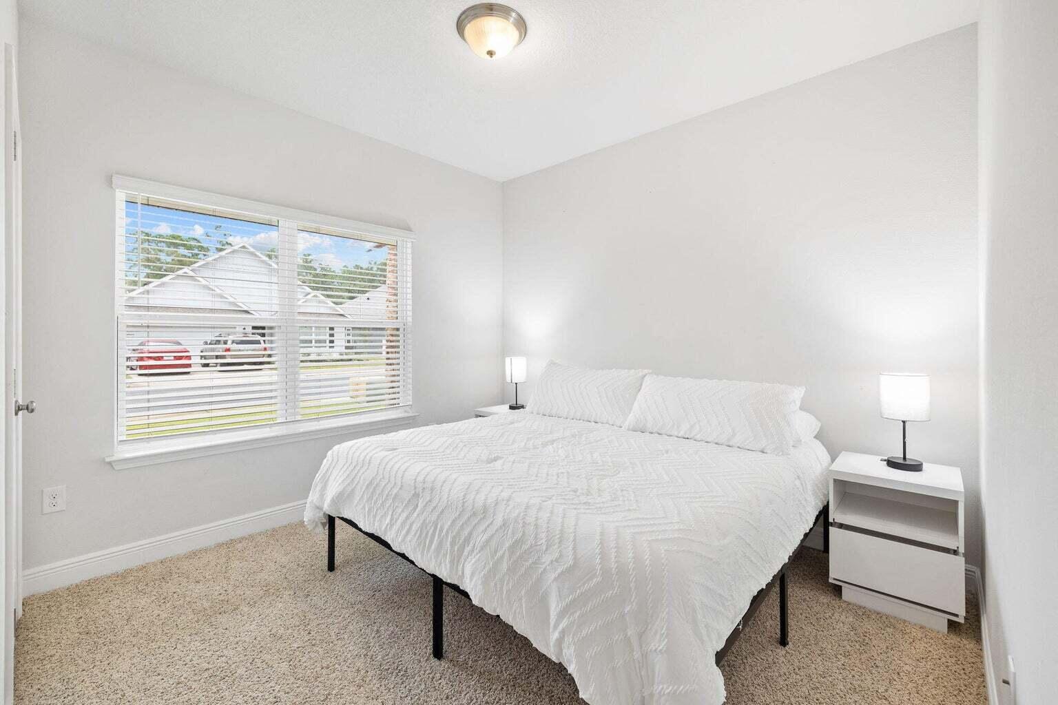 161 Southern Pnes Road Santa Rosa Beach, FL 32459 - Photo 6 of 20 a bedroom with a bed and a window