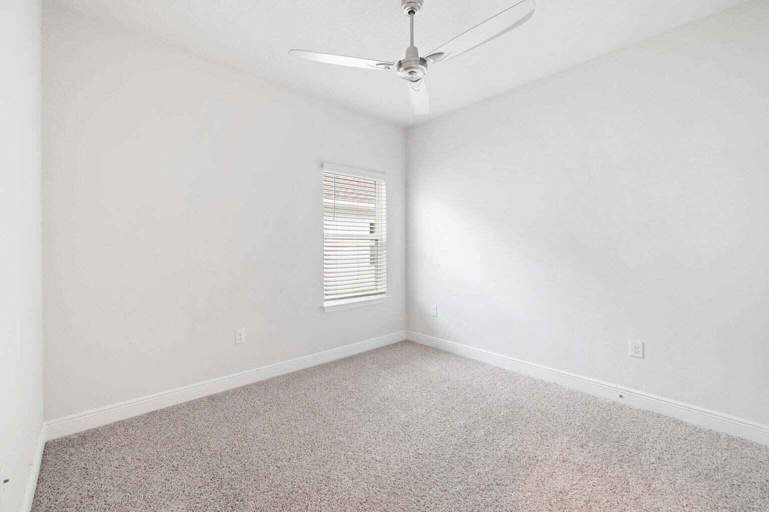 161 Southern Pnes Road Santa Rosa Beach, FL 32459 - Photo 7 of 20 an empty room with a window and a fan