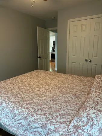 a bedroom with a bed