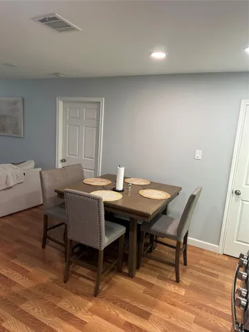a view of a dining room with furniture