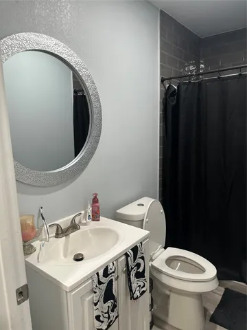 a bathroom with a sink and a toilet
