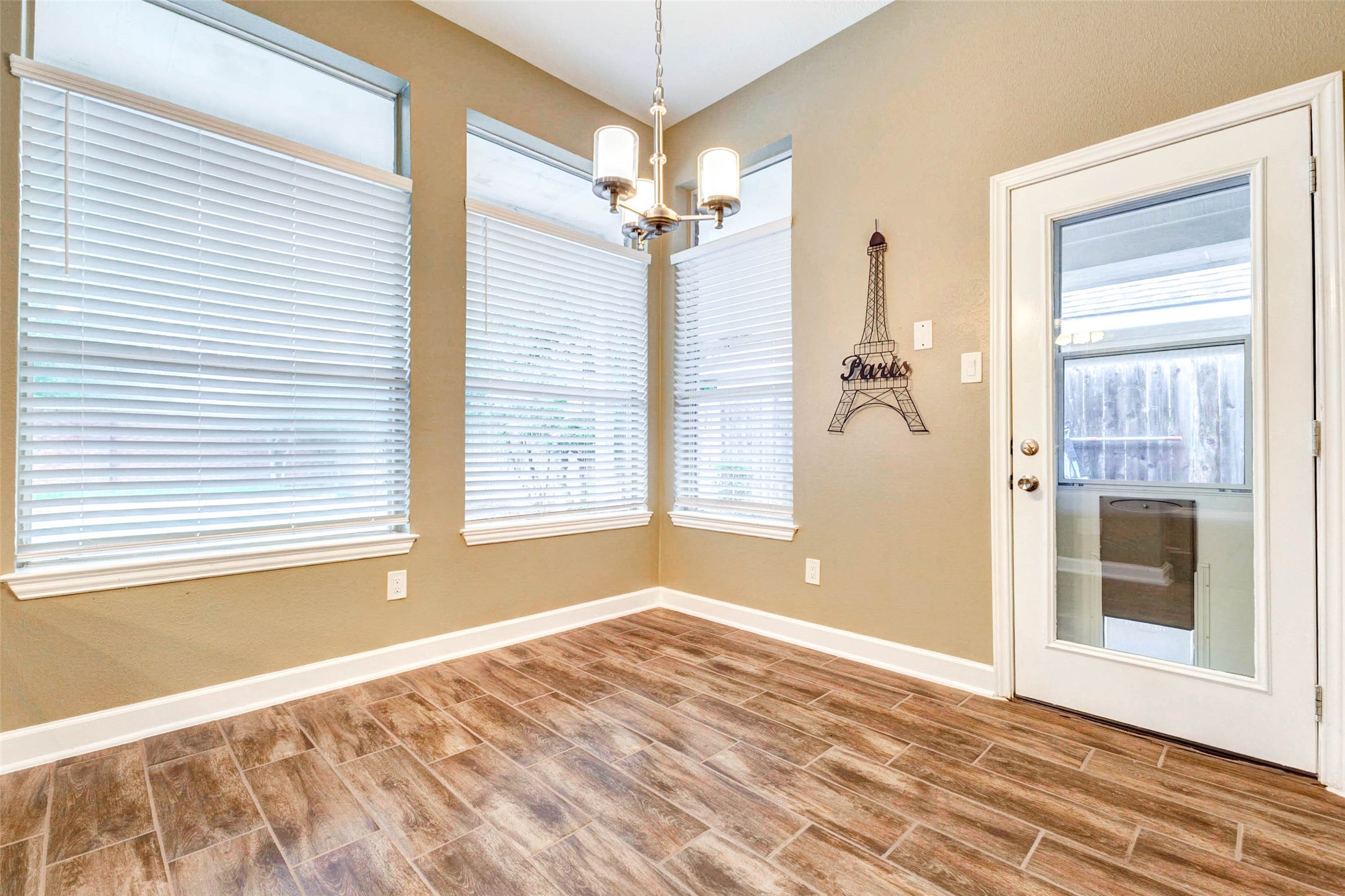 6334 Sampras Ace Court Spring, TX 77379 - Photo 21 of 48 Kitchen breakfast area. Notice the handy pet door.