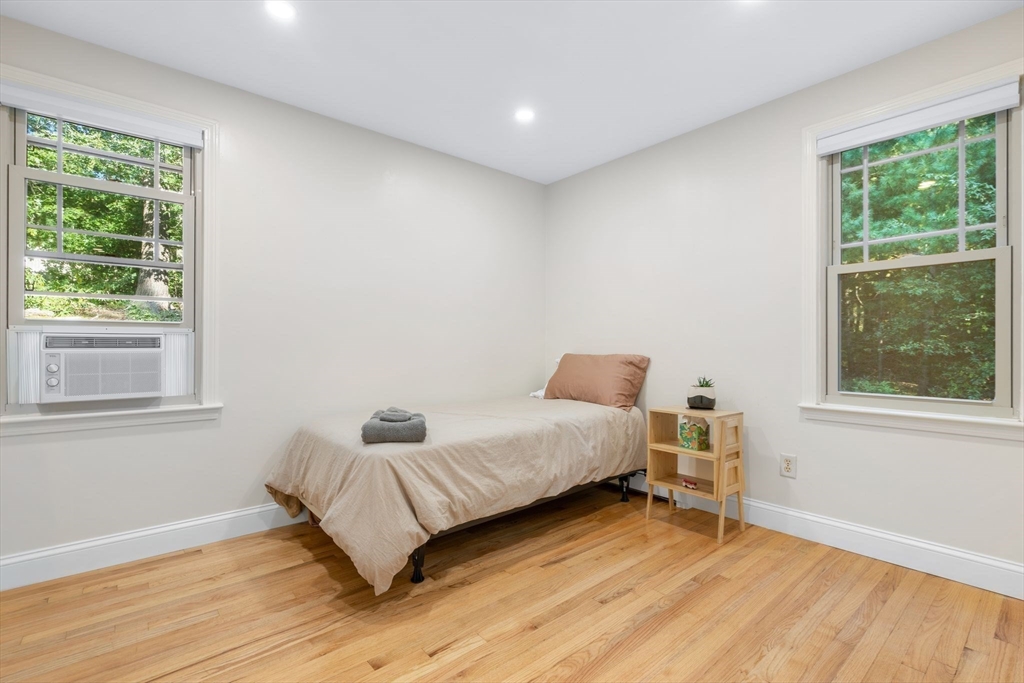 7 Hunter's Trail Sandwich, MA 02563 - Photo 19 of 27 a bedroom with a bed and a window