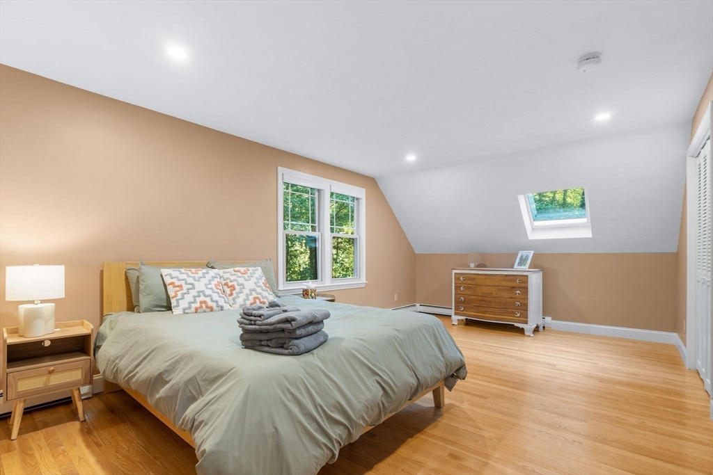 7 Hunter's Trail Sandwich, MA 02563 - Photo 20 of 27 a bedroom with a bed and a window