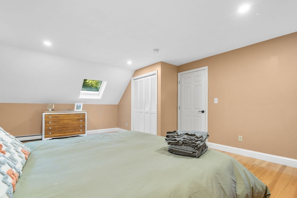 7 Hunter's Trail Sandwich, MA 02563 - Photo 21 of 27 a bedroom with a bed and a window