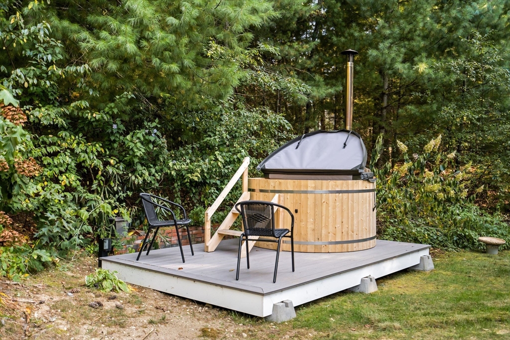 7 Hunter's Trail Sandwich, MA 02563 - Photo 4 of 27 a view of a chairs in a patio