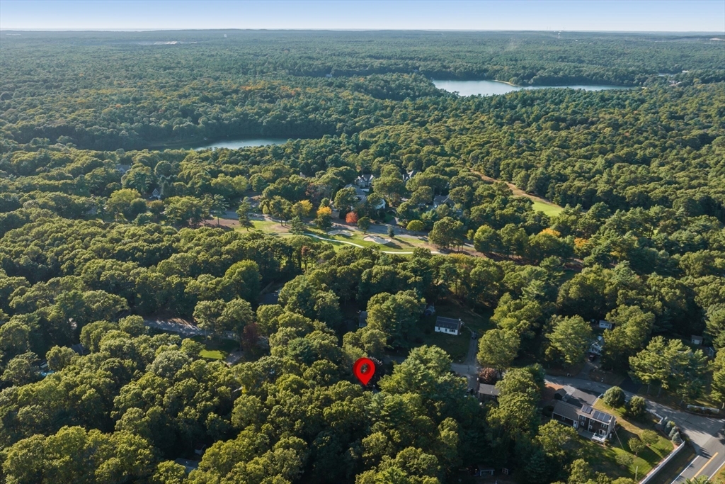 7 Hunter's Trail Sandwich, MA 02563 - Photo 8 of 27 an aerial view of residential house with outdoor space and trees all around