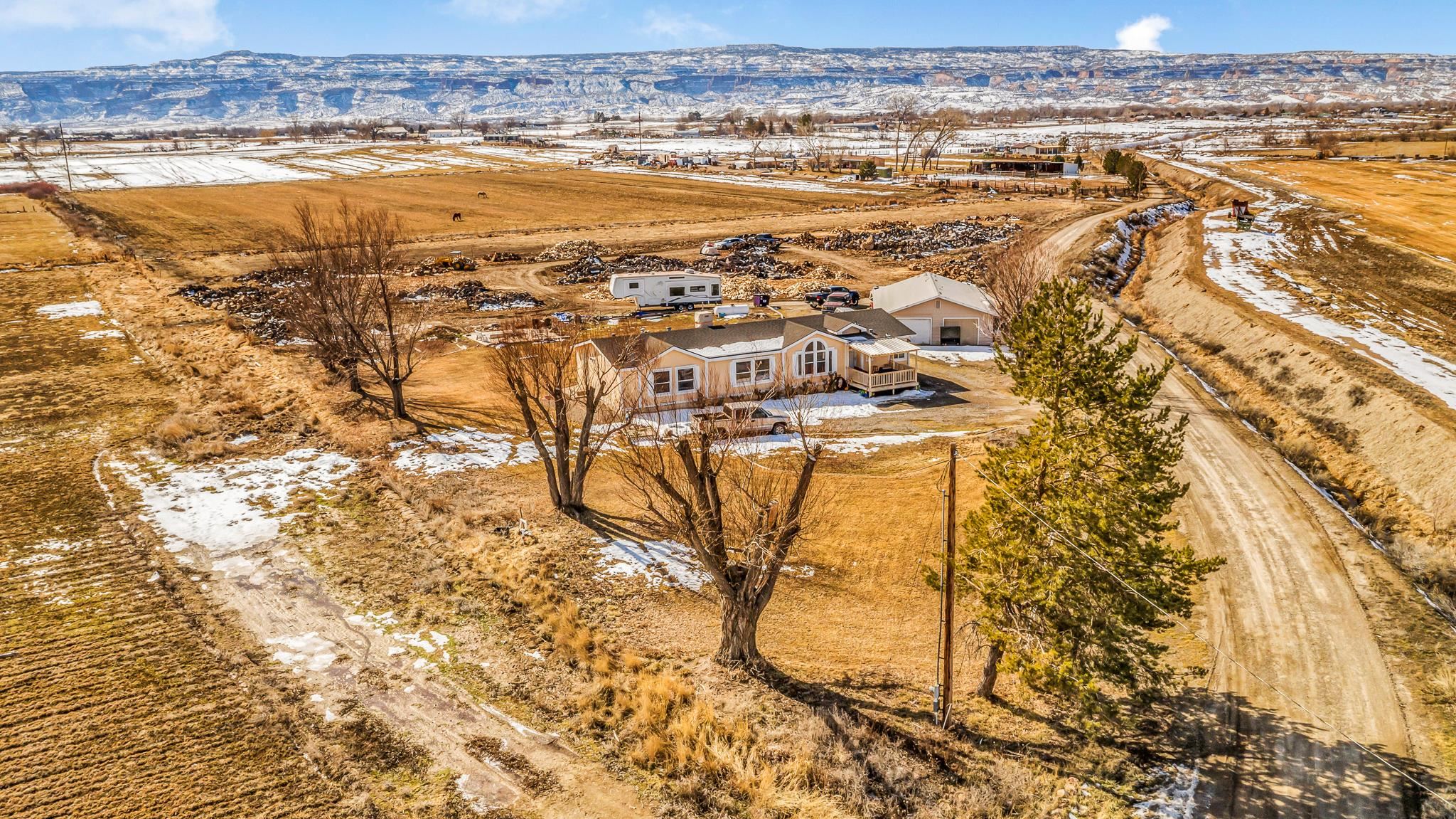 an aerial view of residential building and ocean view