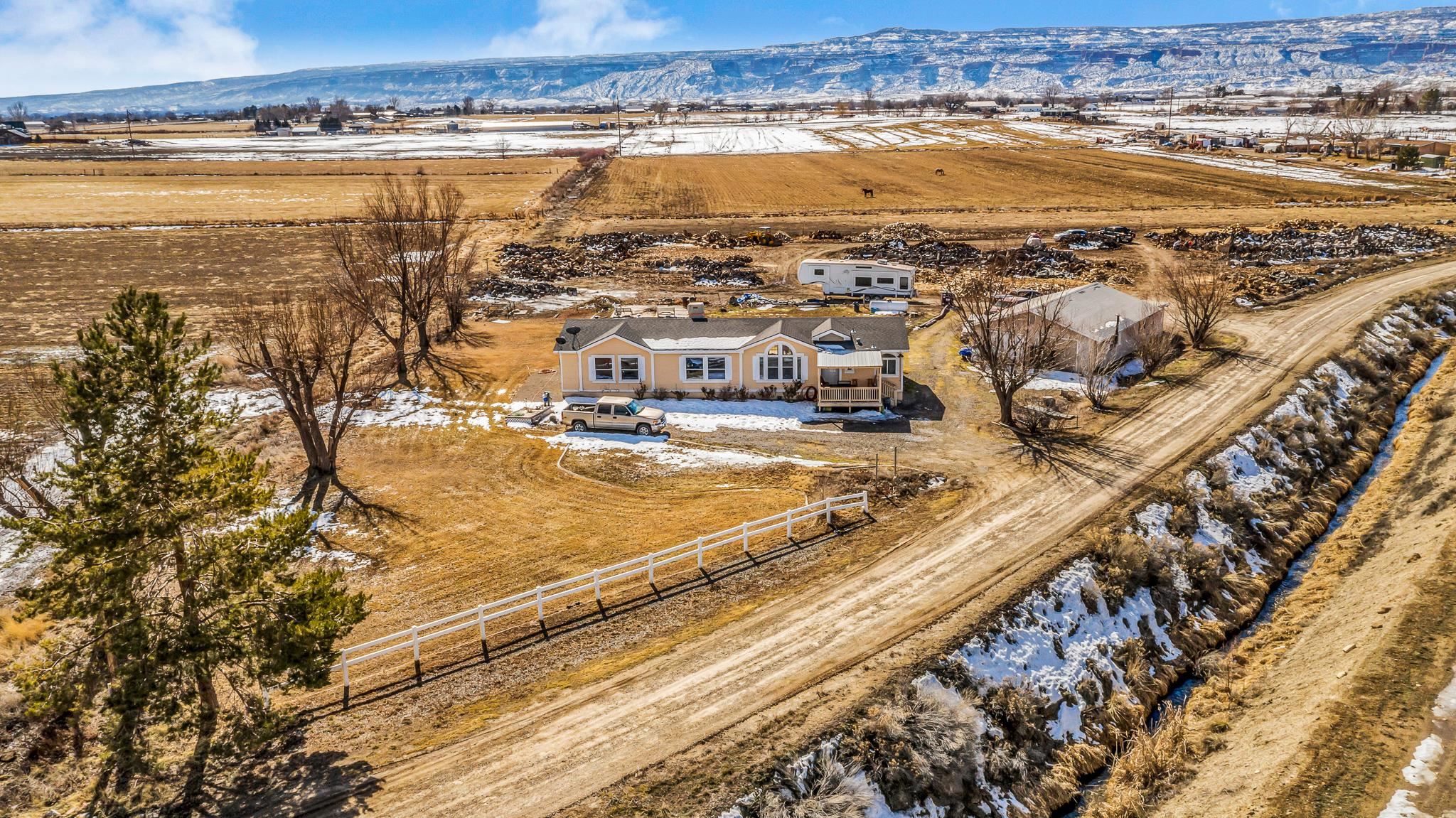1825 M Road Fruita, CO 81521 - Photo 23 of 29 an aerial view of residential building and ocean