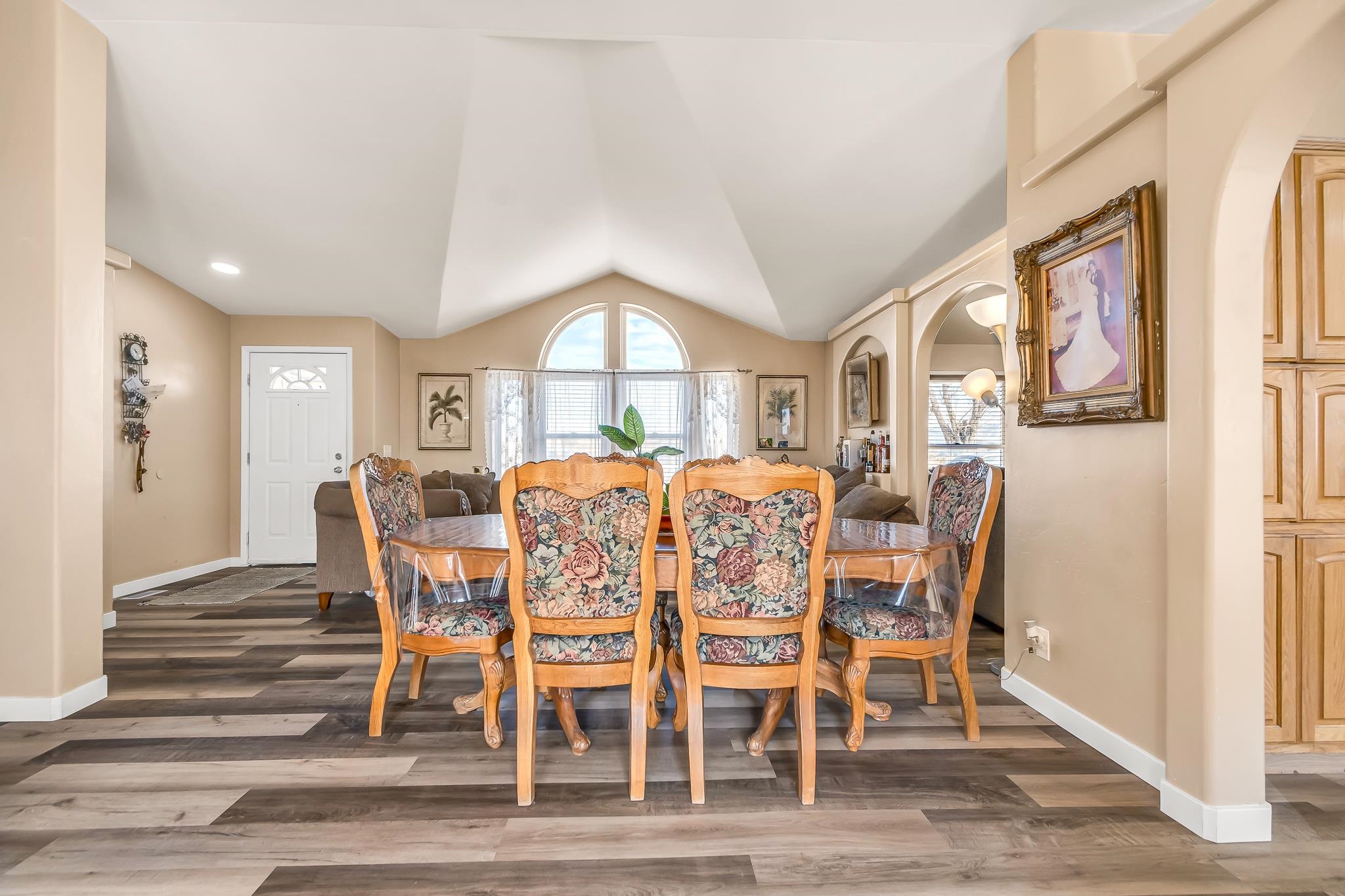 1825 M Road Fruita, CO 81521 - Photo 5 of 29 a view of a dining room with furniture window and wooden floor