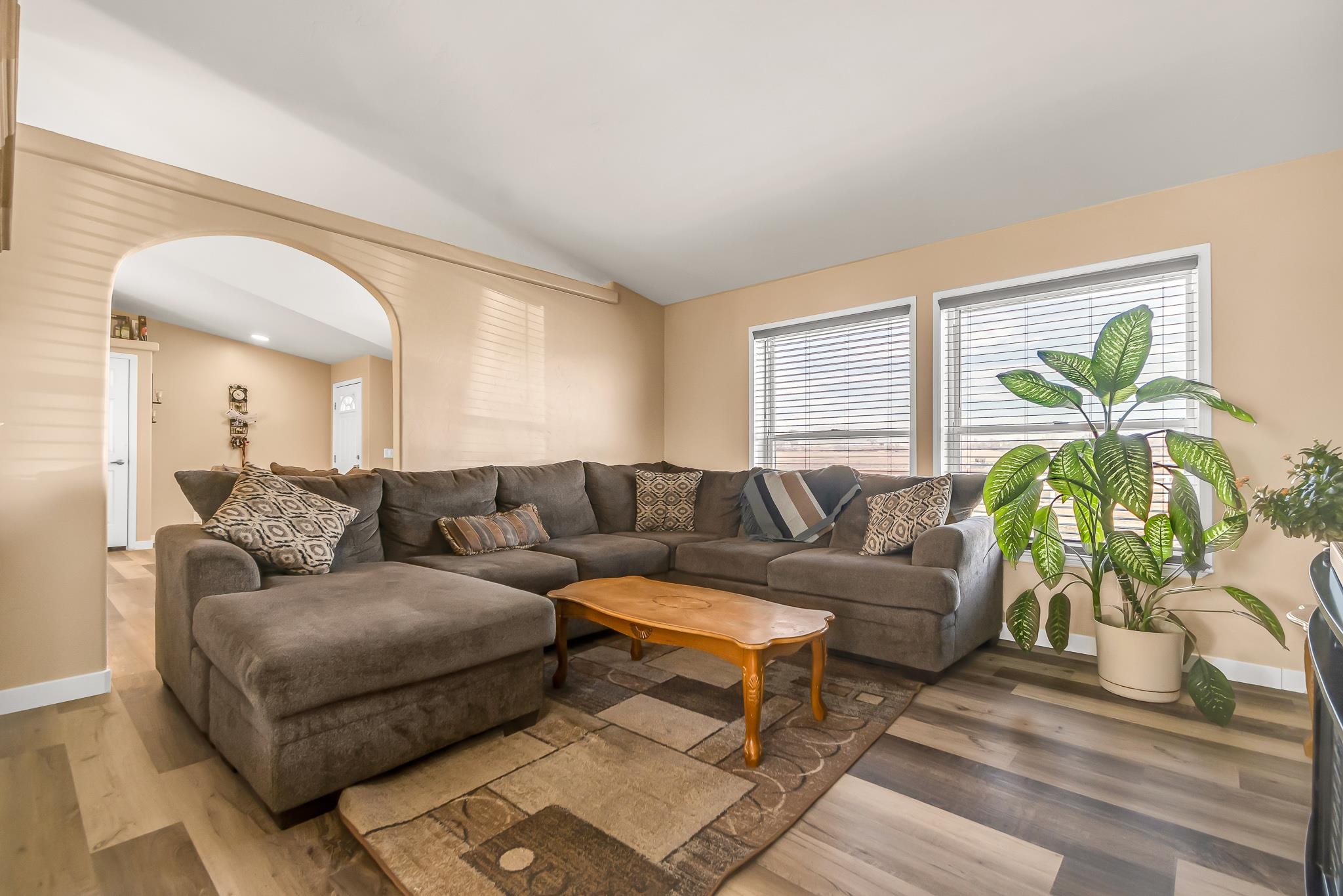 1825 M Road Fruita, CO 81521 - Photo 6 of 29 a living room with furniture and a large window