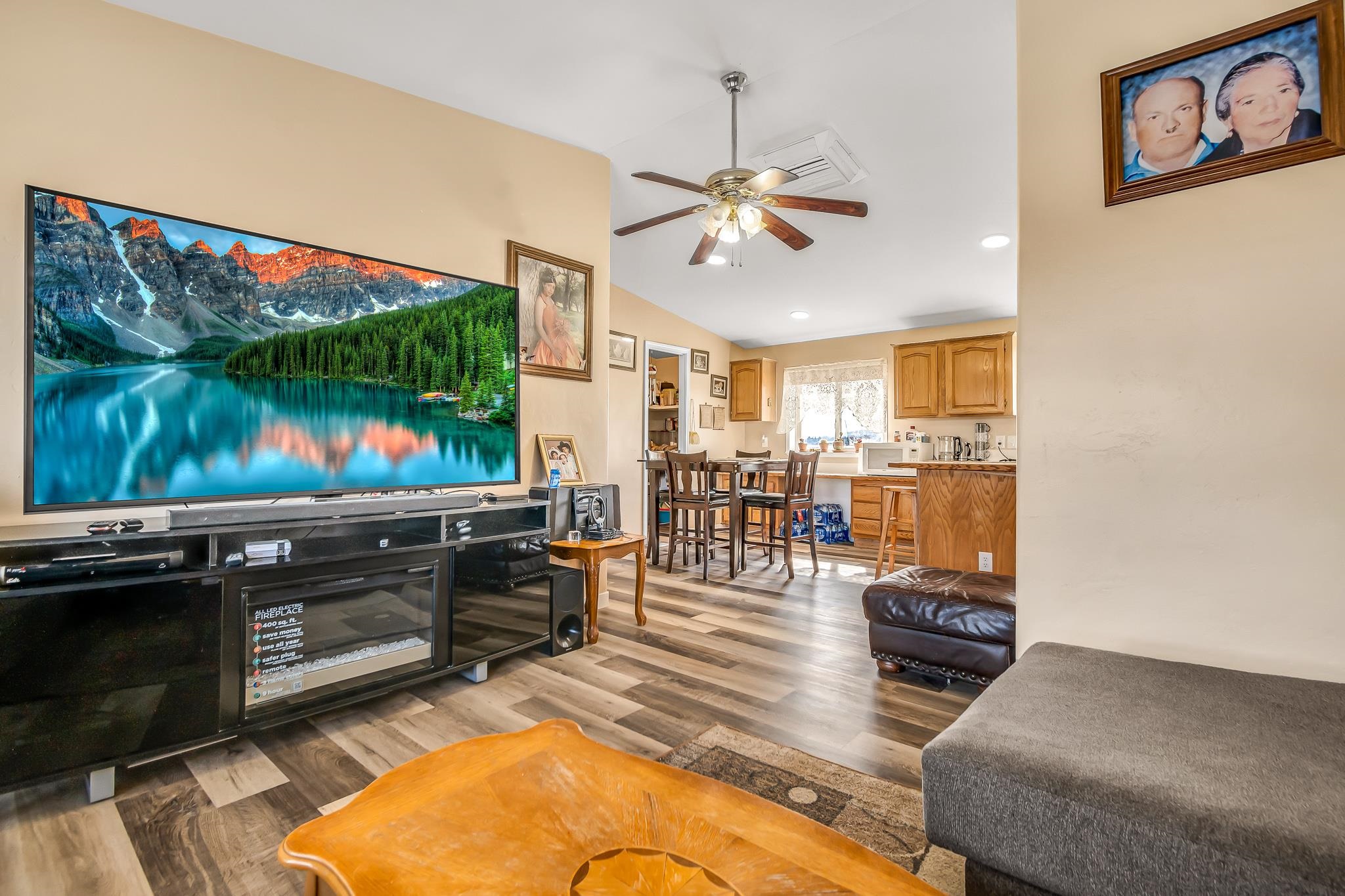 1825 M Road Fruita, CO 81521 - Photo 7 of 29 a living room with furniture and a flat screen tv