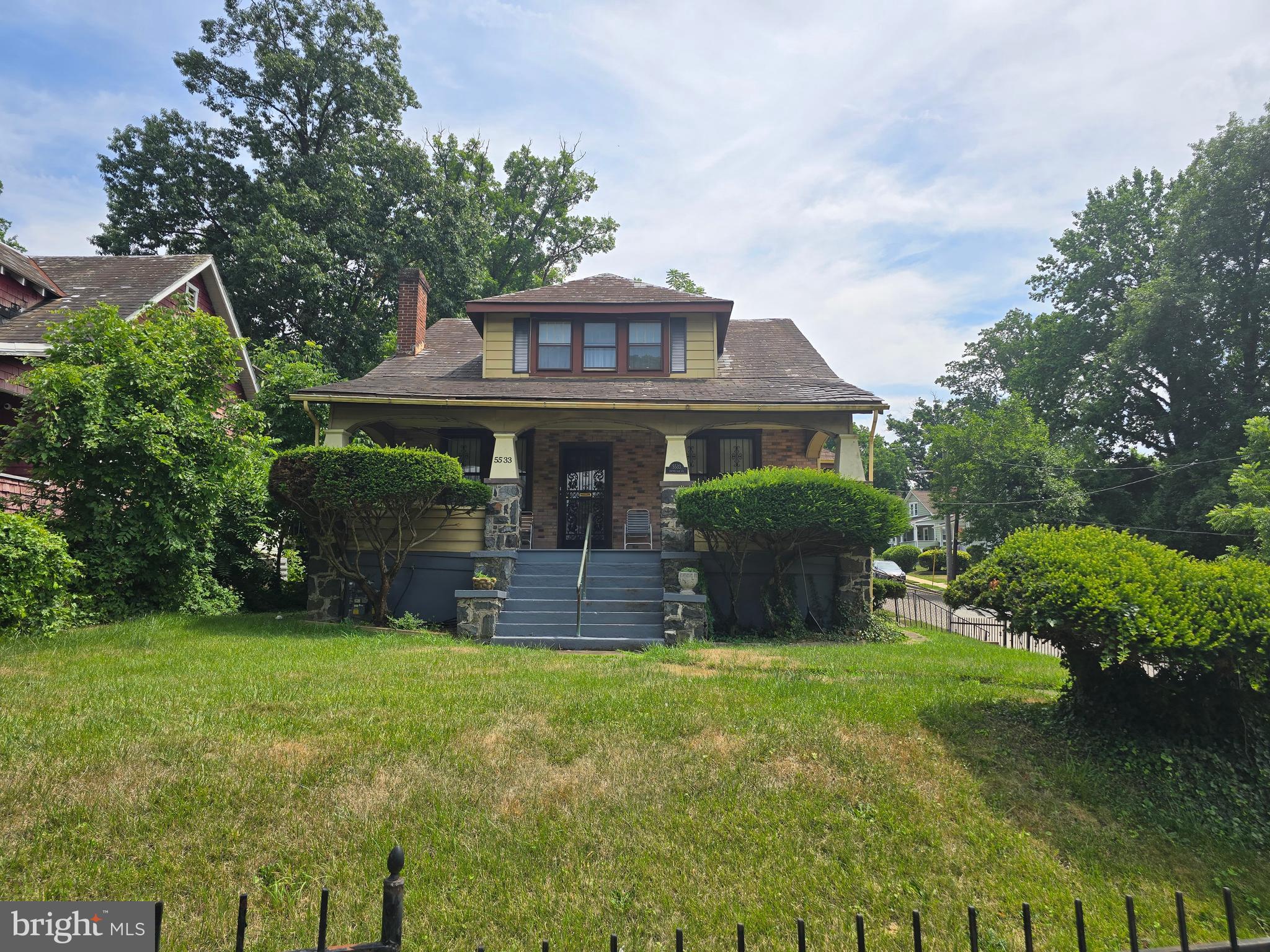 5533 Gwynn Oak Baltimore, MD 21207 - Photo 2 of 44 a front view of a house with garden