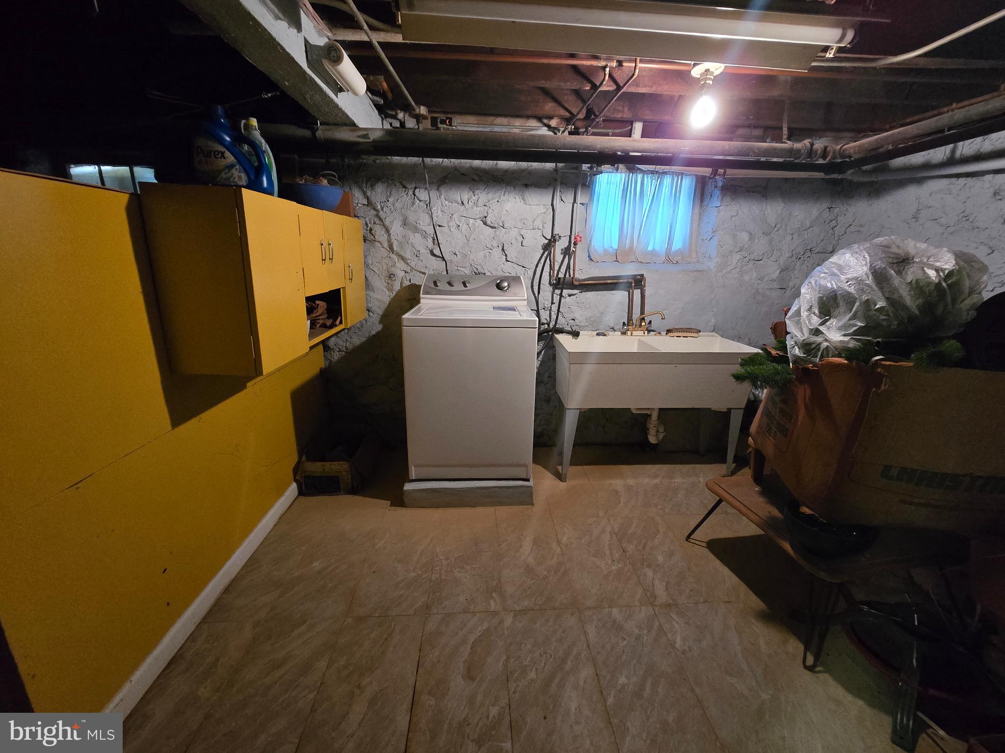 5533 Gwynn Oak Baltimore, MD 21207 - Photo 27 of 44 a view of storage and utility room with racks