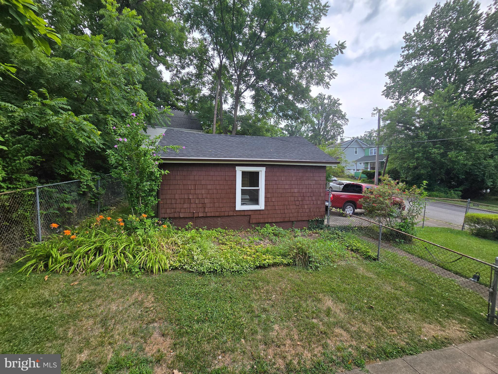 5533 Gwynn Oak Baltimore, MD 21207 - Photo 29 of 44 a front view of a house with garden