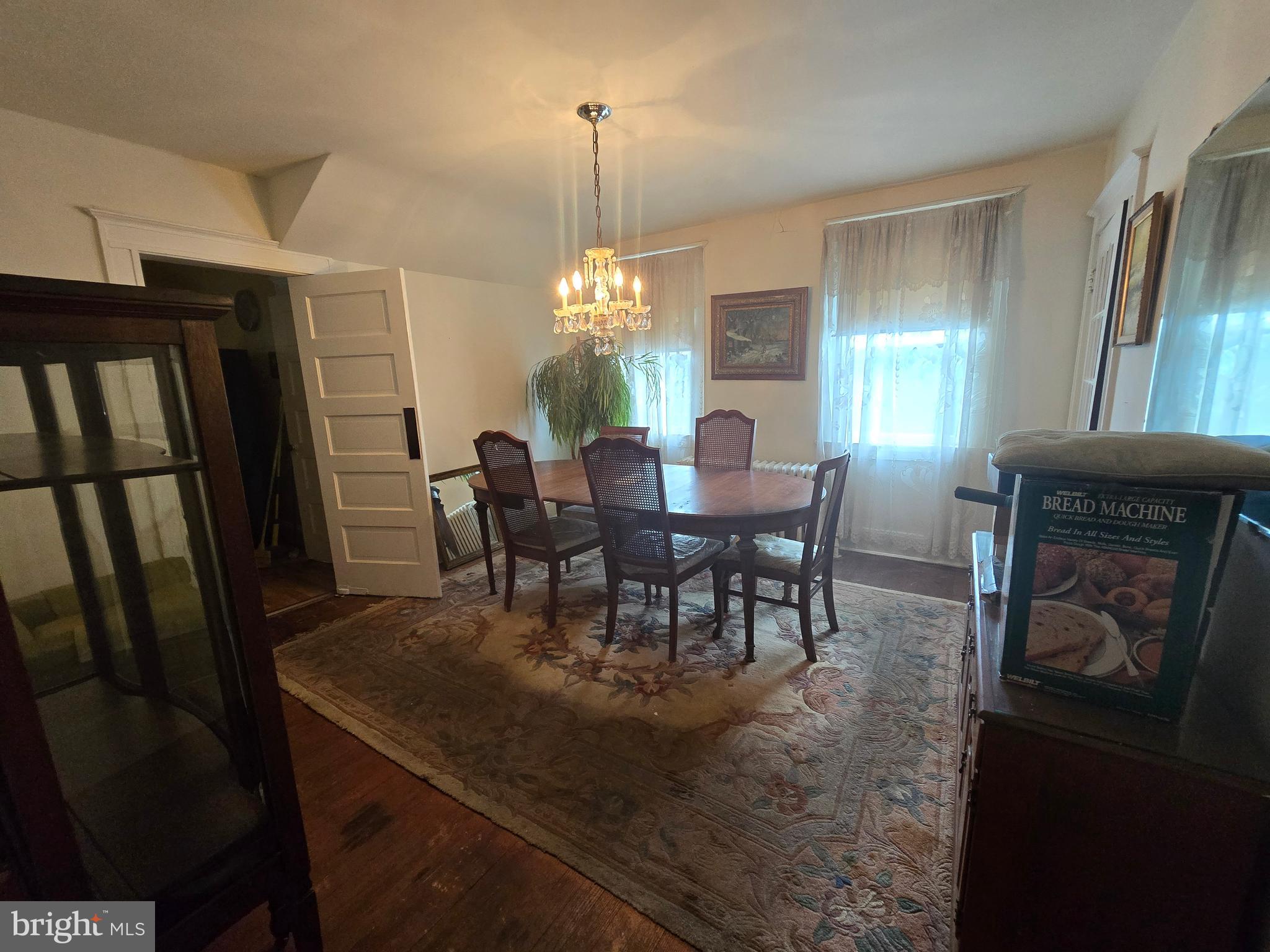 5533 Gwynn Oak Baltimore, MD 21207 - Photo 32 of 44 a view of a dining room with furniture and window
