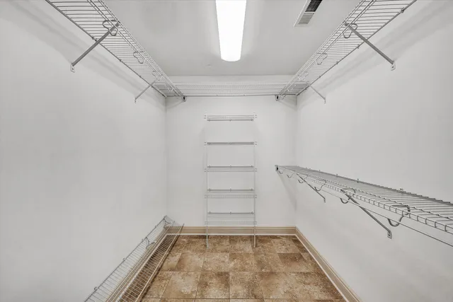 a view of a room with racks on the wall